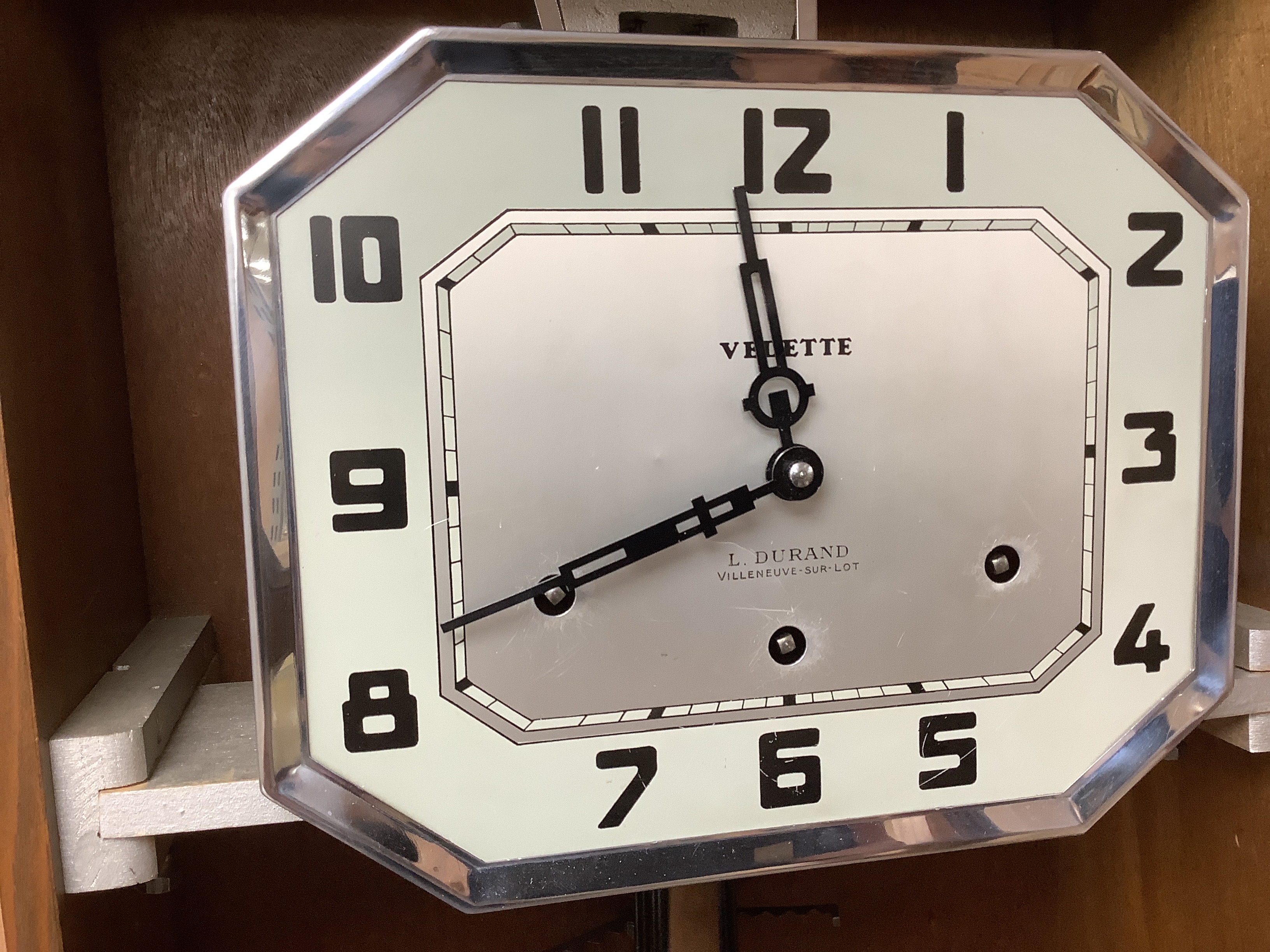 An Art Deco Westminster chiming walnut wall clock